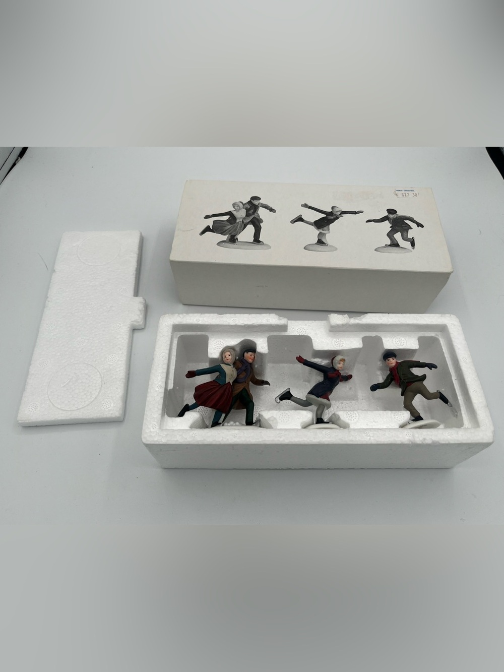 2001 Retired Heritage Village Collection: "Skating Party" Dept. 56